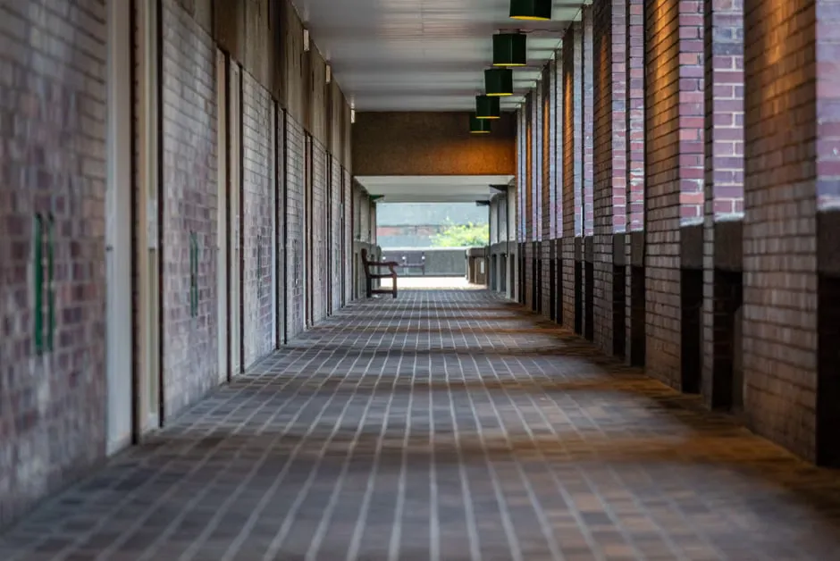 Corridor light above a resident's door in a quiet residential aged care wing