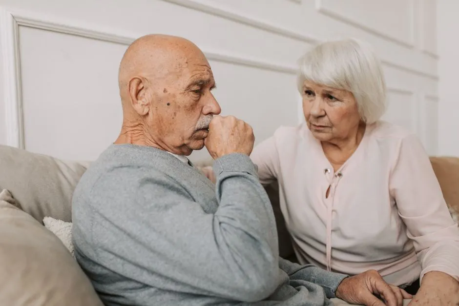 Aged care resident's room with a pull cord above the bed and a call button within reach